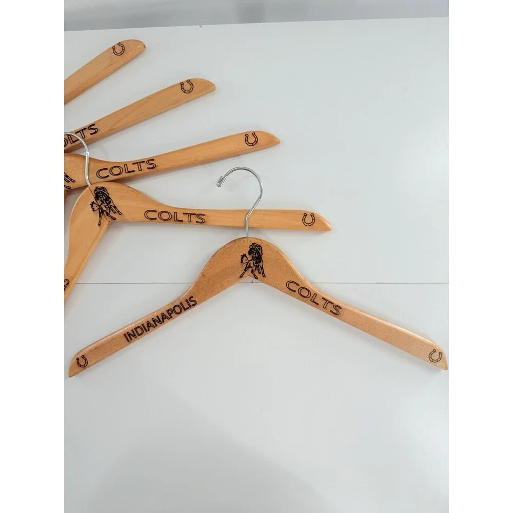 5 Custom natural wood Indianapolis Colts-branded suit hangers.